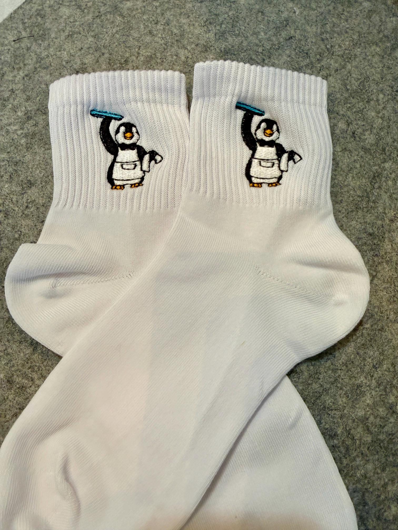 My favorite Penguin Waiter with blue tray embroidered ladies socks.