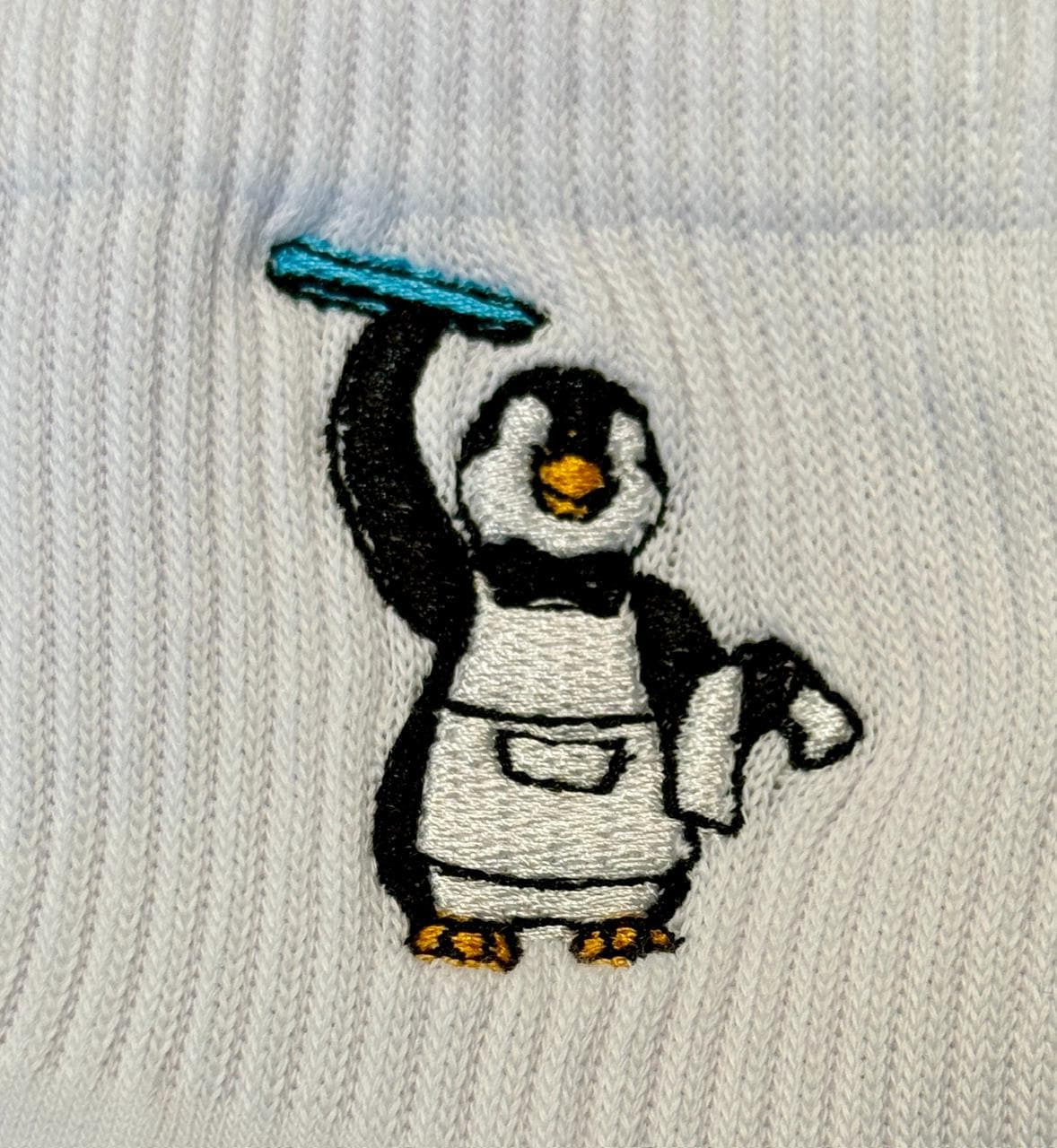 My favorite Penguin Waiter with blue tray embroidered ladies socks.